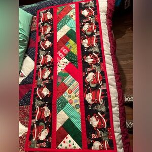 Homemade patchwork machine and hand quilted reversible Christmas decoration31x15